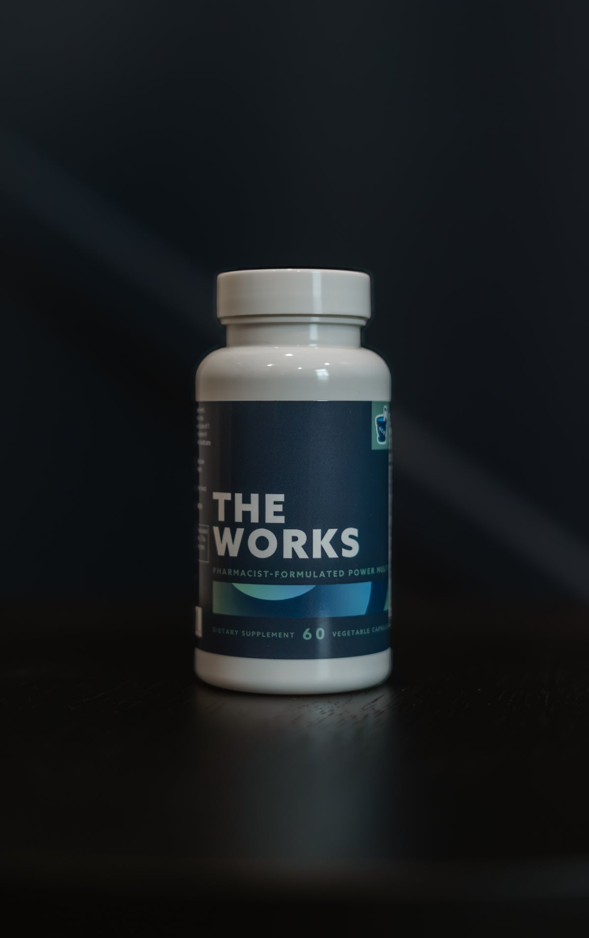 THE WORKS daily multivitamin bottle from North Century Pharmacy
