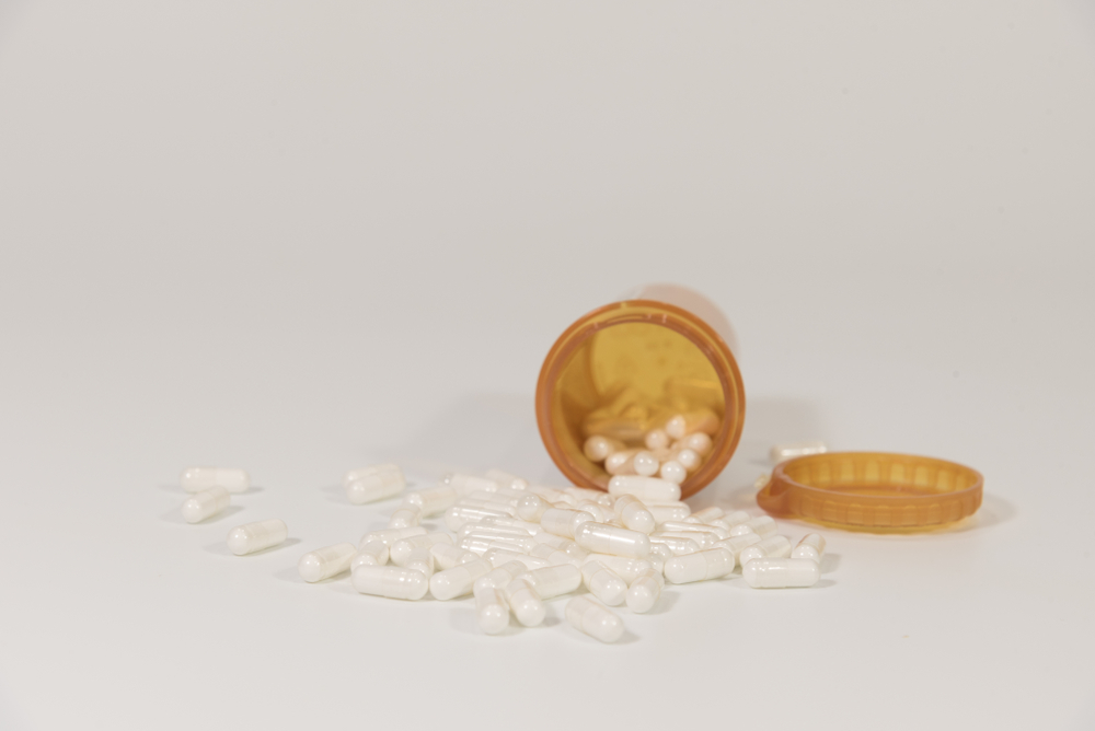 low dose naltrexone pills spilling out of a prescription bottle
